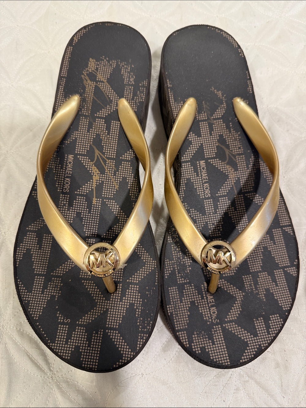 Michael Kors Black and Gold MK Logo Flip Flop Sandals
